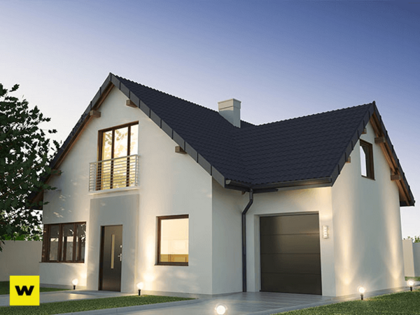 Modernes Einfamilienhaus mit Garage, Satteldach und Vorgarten bei Abenddämmerung.